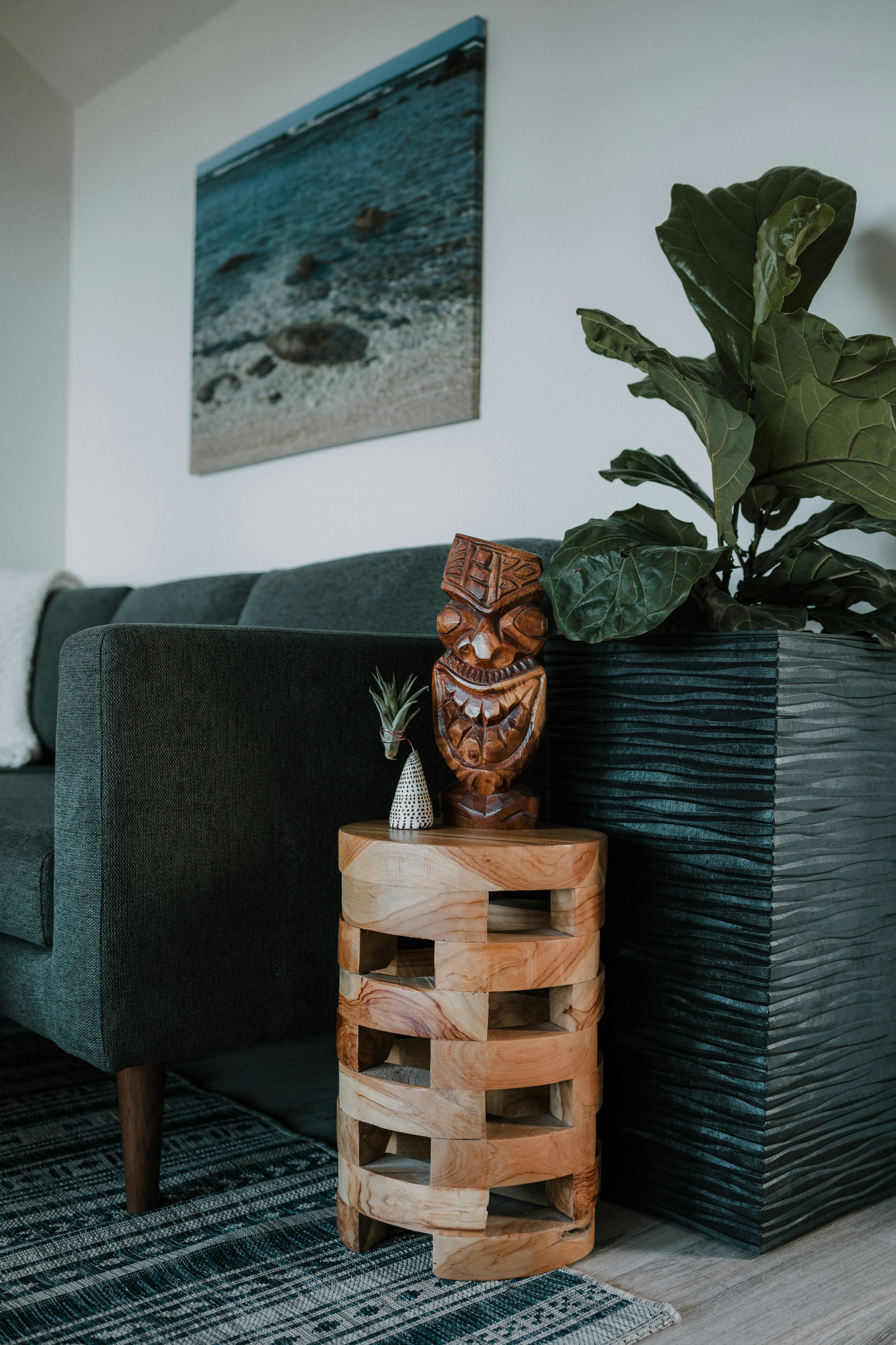 brown woven basket on gray armchair